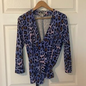 Diane Von Furstenberg two piece animal print- skirt and wrap blouse
